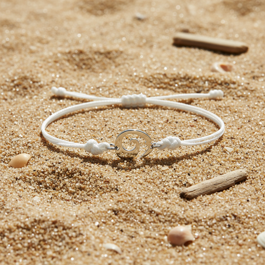 Bracelet blanc sur le sable